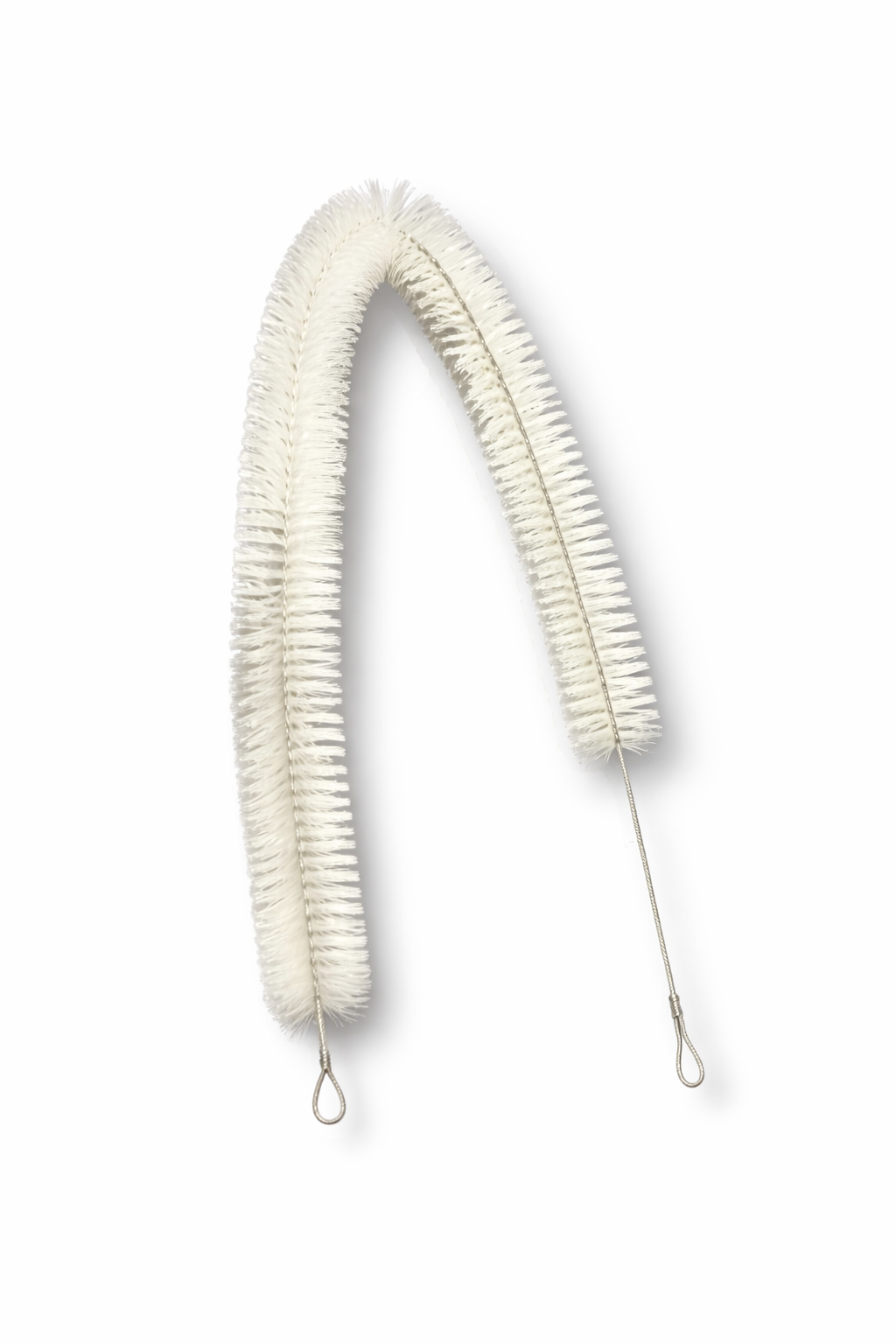 Coiled white spring brush on a white background